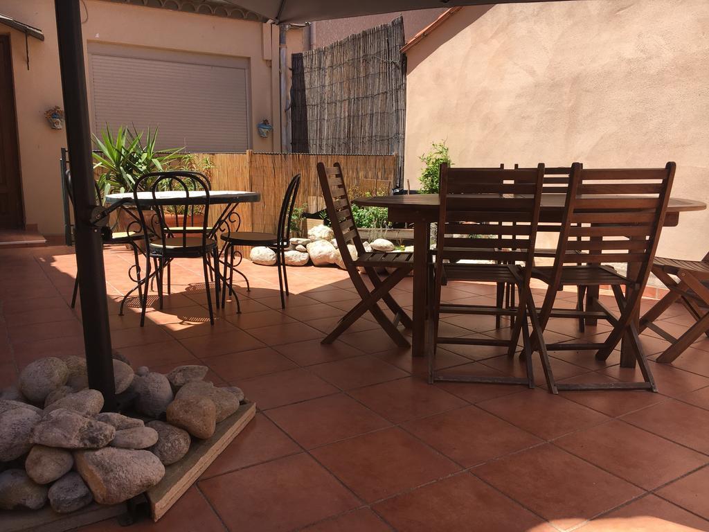 Hotel Le Centre Le Boulou Bagian luar foto