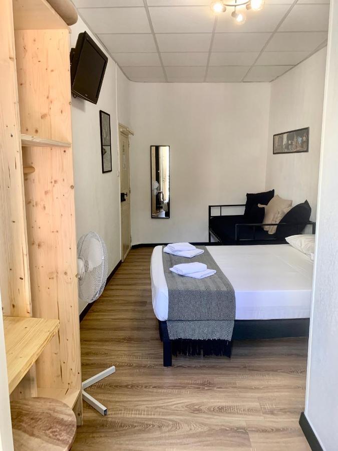 Hotel Le Centre Le Boulou Bagian luar foto